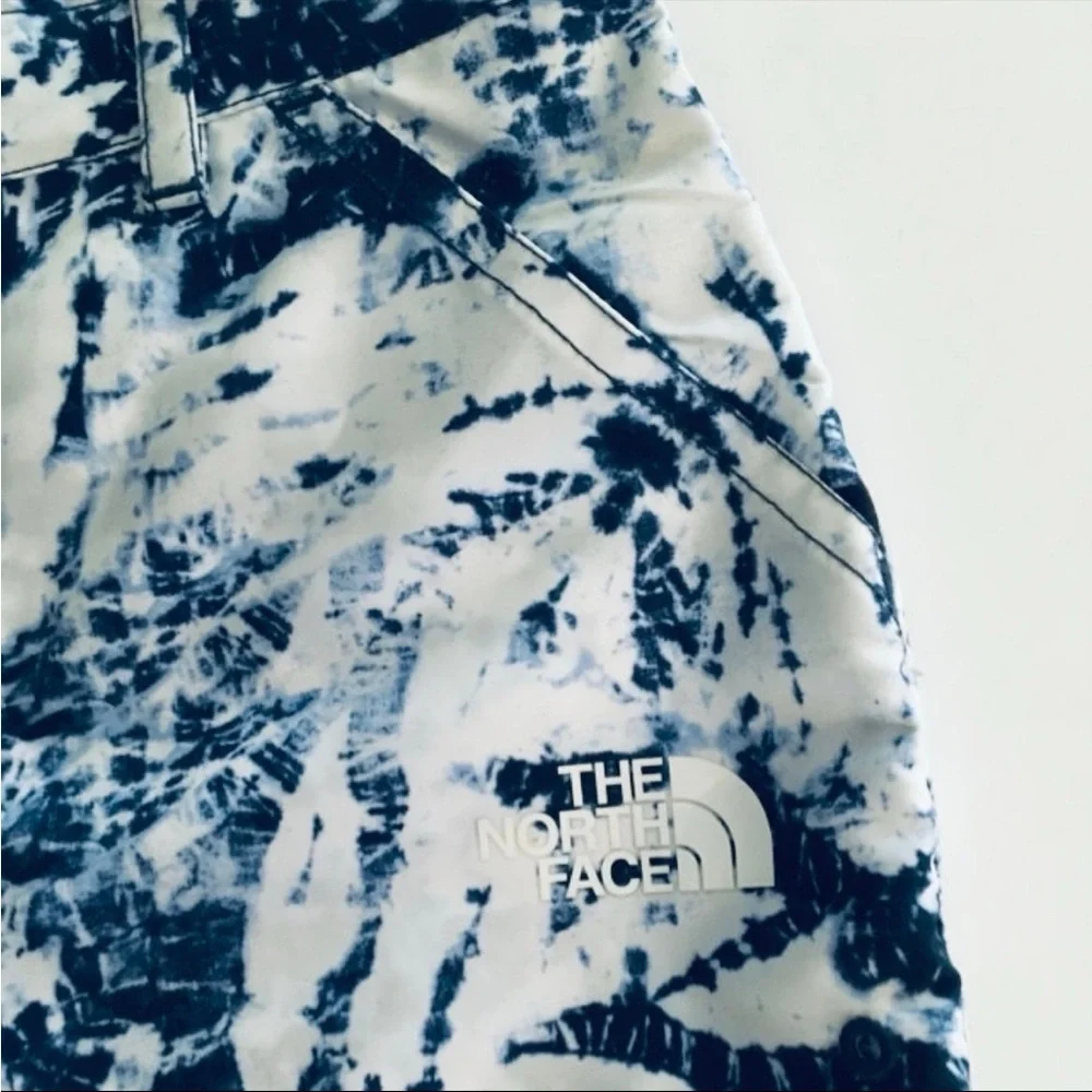 - Like-new North Face blue shorts